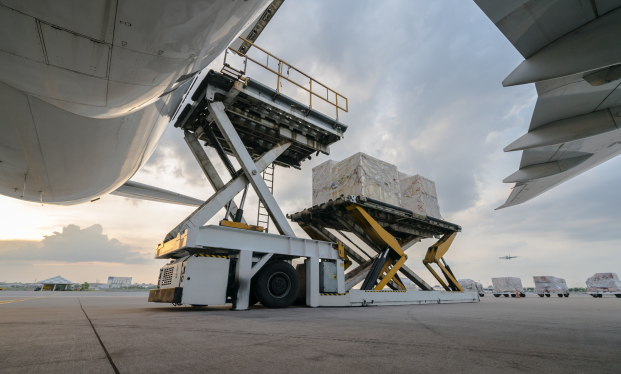 stock-photo-loading-cargo-outside-cargo-plane-737651131 1